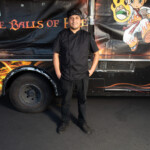 Chef standing in front of the Rice Balls of Fire food truck at Generous Plates benefiting Union Station Homeless Services (USHS)